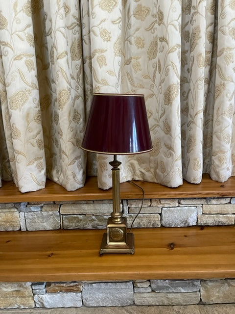 Brass table lamp with red metal shade