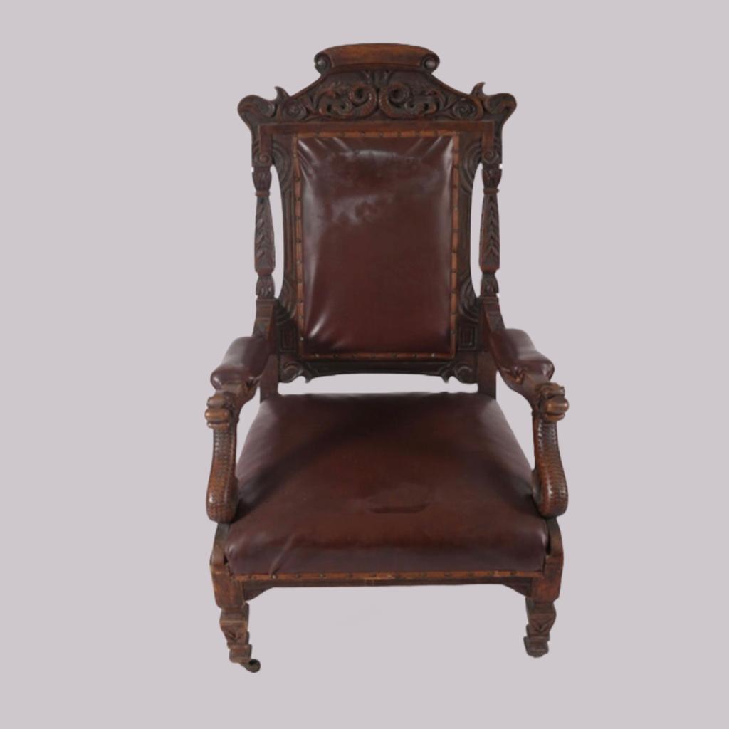 A Pair of Carved Oak Jacobean Elbow Chairs