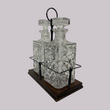 Load image into Gallery viewer, Mahogany and Brass Tantalus with Crystal Decanters
